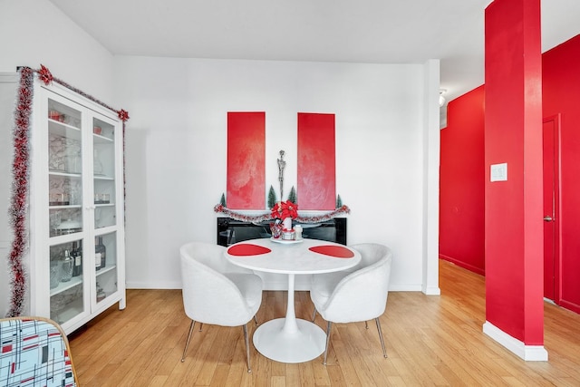 dining room featuring light hardwood / wood-style floors