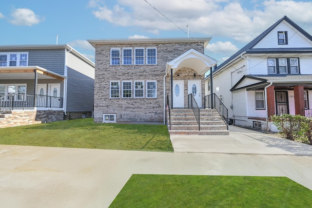 view of front of home featuring a front yard