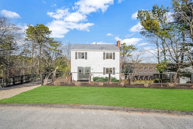 view of front of house with a front yard