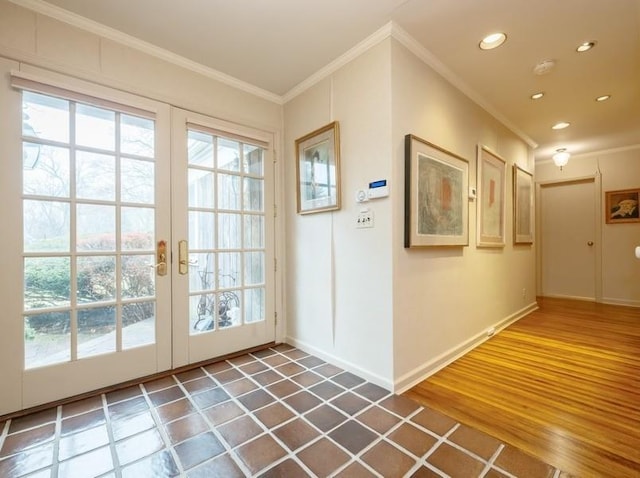 entryway featuring ornamental molding, dark hardwood / wood-style floors, and french doors