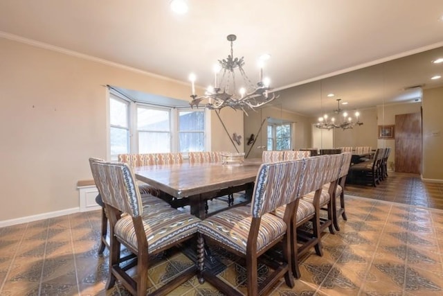 dining room with ornamental molding and a chandelier