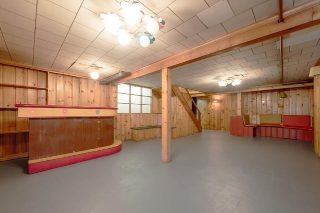 basement with wooden walls