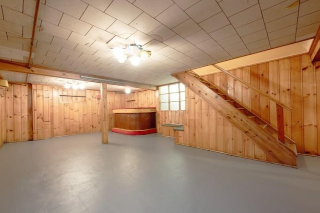 basement with wood walls