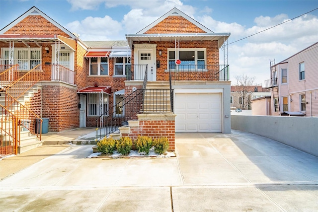 view of front facade with a garage and covered porch