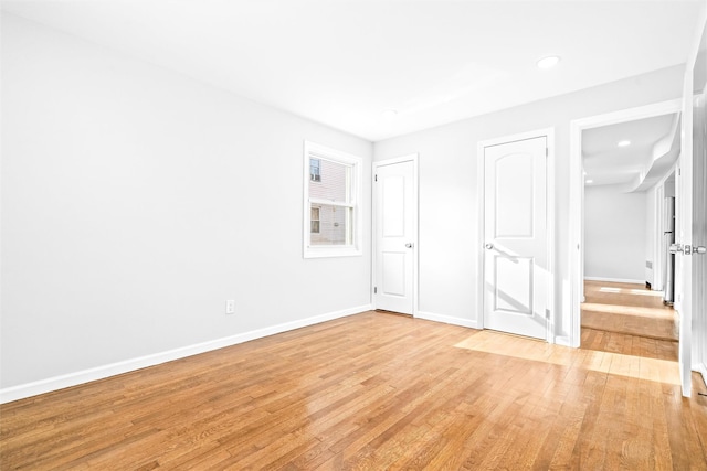 unfurnished bedroom featuring light hardwood / wood-style floors