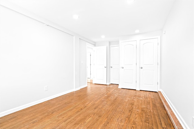 unfurnished bedroom featuring light hardwood / wood-style flooring