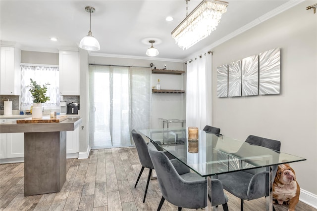 dining room with ornamental molding