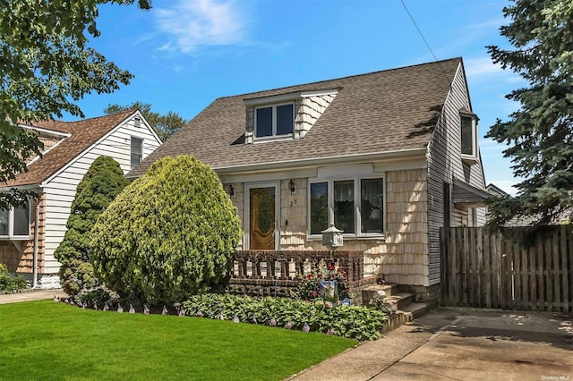 view of front of house with a front lawn