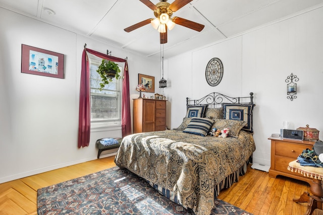 bedroom featuring ceiling fan and hardwood / wood-style floors