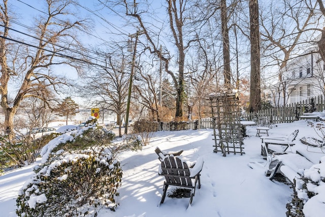 view of yard layered in snow