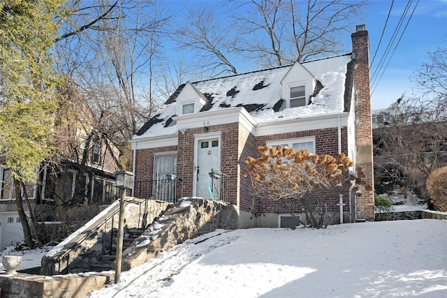 view of new england style home