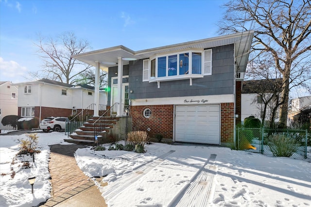 view of front of property featuring a garage