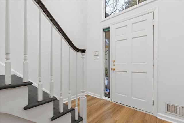 foyer entrance featuring hardwood / wood-style flooring