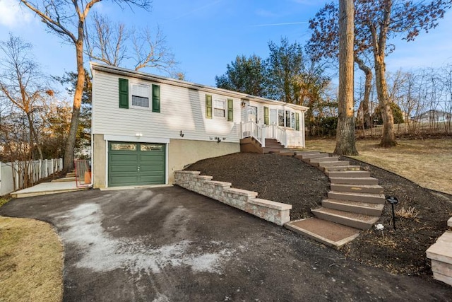 view of front of house with a garage