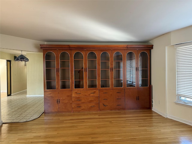 spare room featuring light hardwood / wood-style flooring