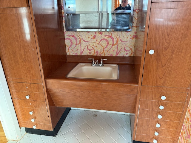 bathroom featuring vanity and tile patterned flooring