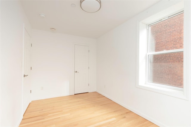 empty room with light wood-type flooring