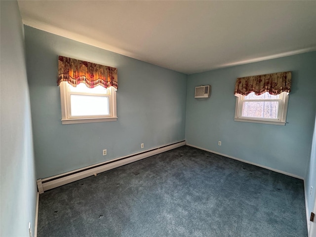 unfurnished room featuring dark colored carpet, plenty of natural light, and a baseboard radiator