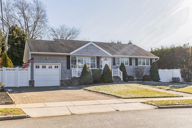 single story home with a garage