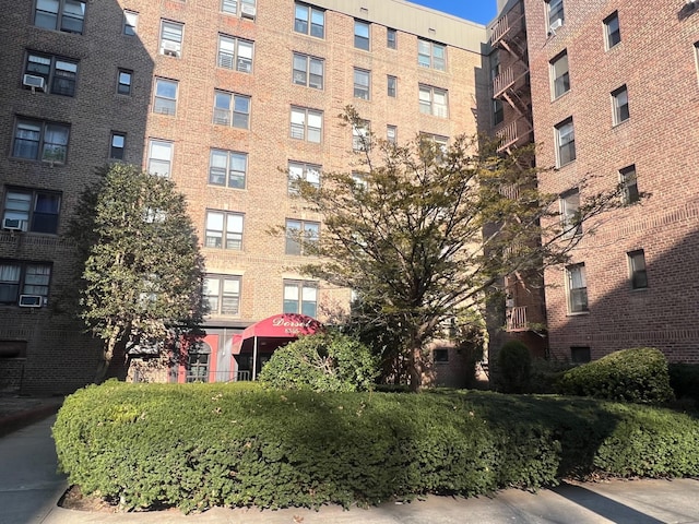 view of building exterior with cooling unit