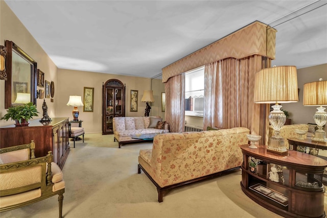 living room with light colored carpet and radiator