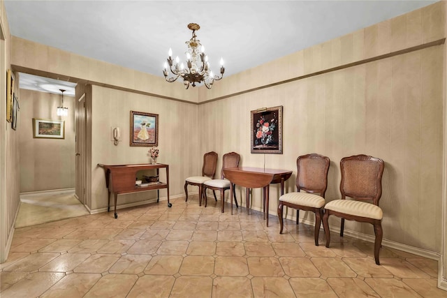 sitting room featuring an inviting chandelier