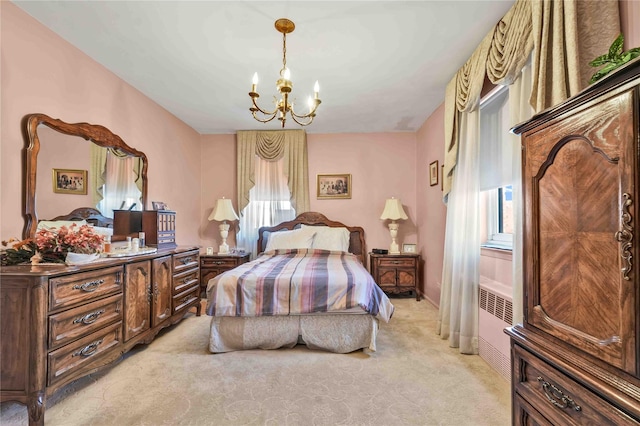 bedroom with light carpet and a notable chandelier