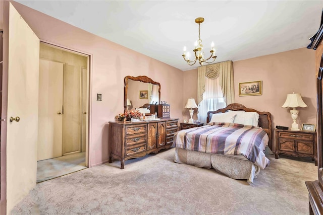 bedroom featuring carpet floors and a notable chandelier