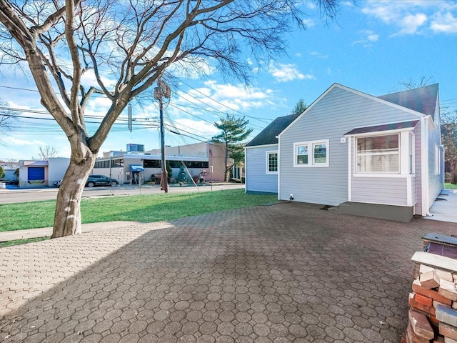 exterior space featuring a lawn