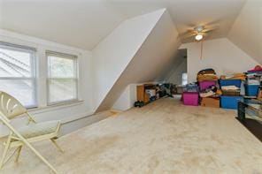 bonus room with ceiling fan, lofted ceiling, and carpet floors