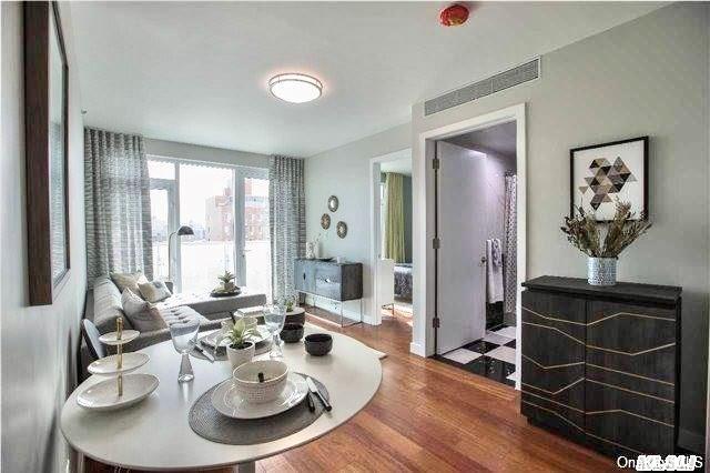 dining area with hardwood / wood-style floors