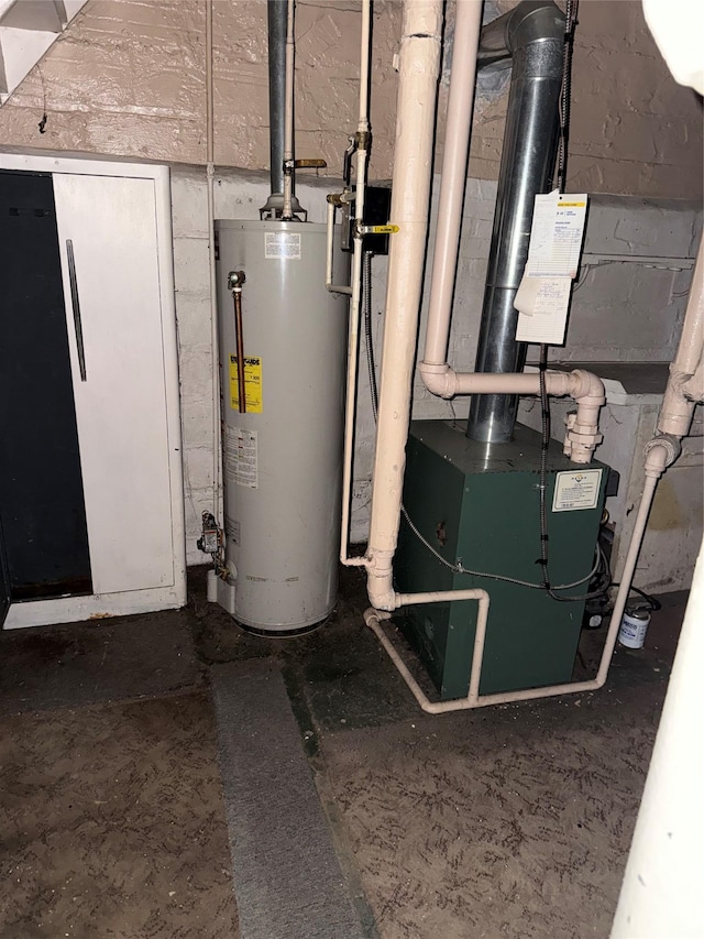 utility room featuring gas water heater