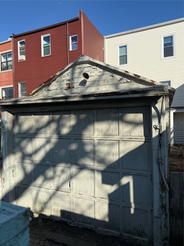 view of property exterior featuring a garage