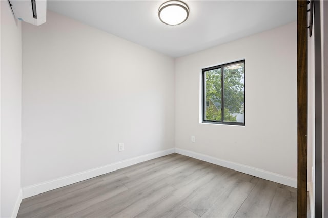 empty room featuring light hardwood / wood-style floors