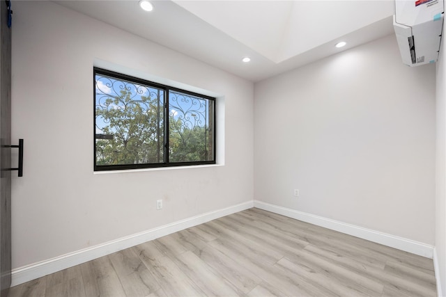 spare room with light wood-type flooring