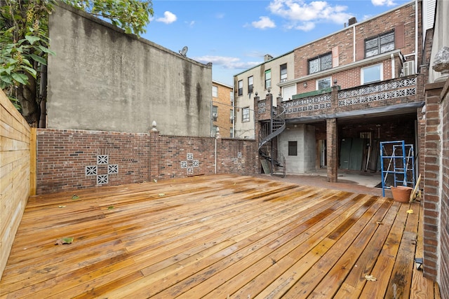 wooden deck with a patio