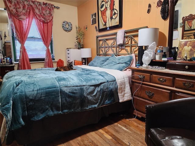 bedroom with light wood-type flooring