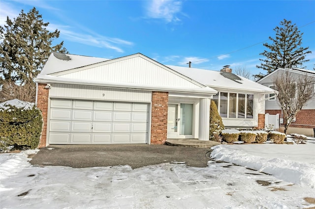 view of front of property featuring a garage