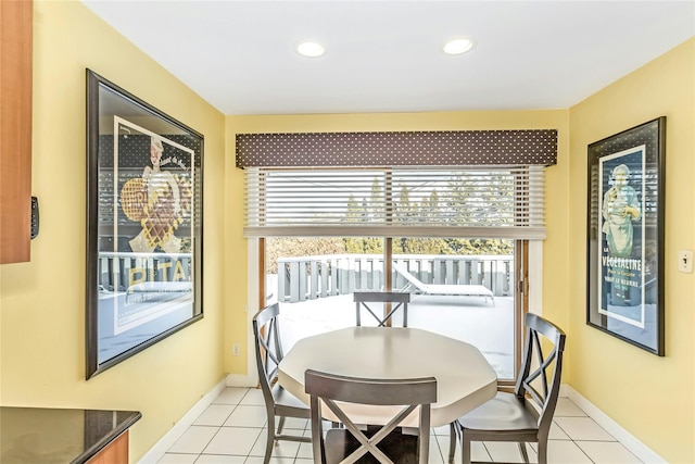 dining area with light tile patterned floors