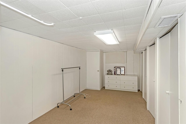 basement with light carpet