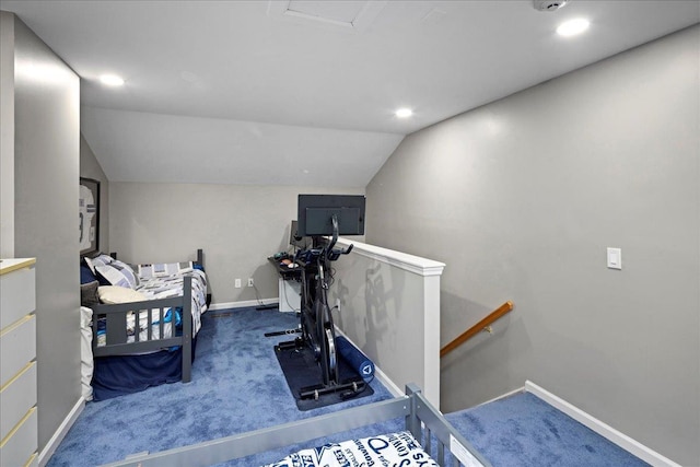 carpeted bedroom featuring vaulted ceiling