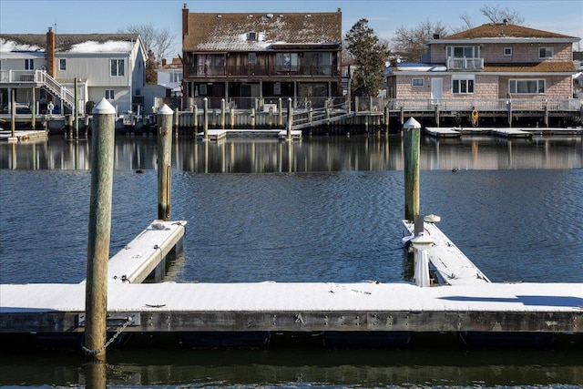 dock area with a water view