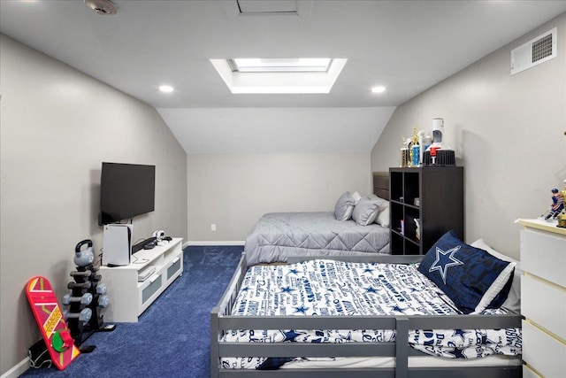 bedroom featuring dark colored carpet, visible vents, vaulted ceiling with skylight, and baseboards