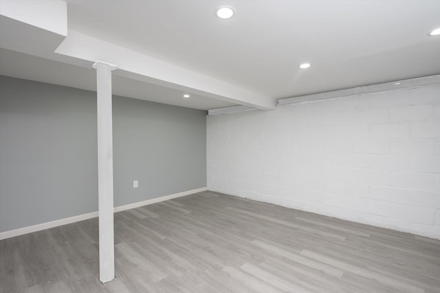 basement featuring light hardwood / wood-style flooring