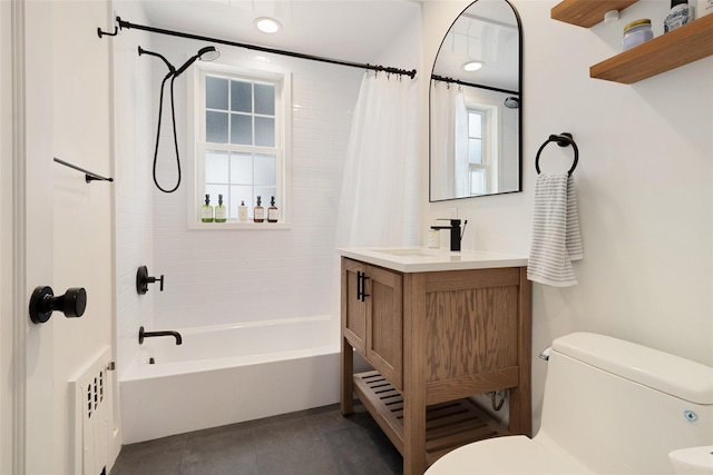 full bathroom with vanity, toilet, and shower / bath combo with shower curtain