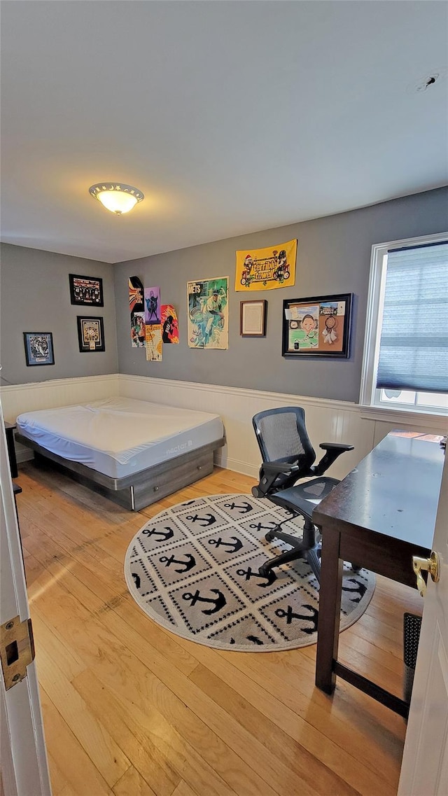 bedroom featuring wood-type flooring