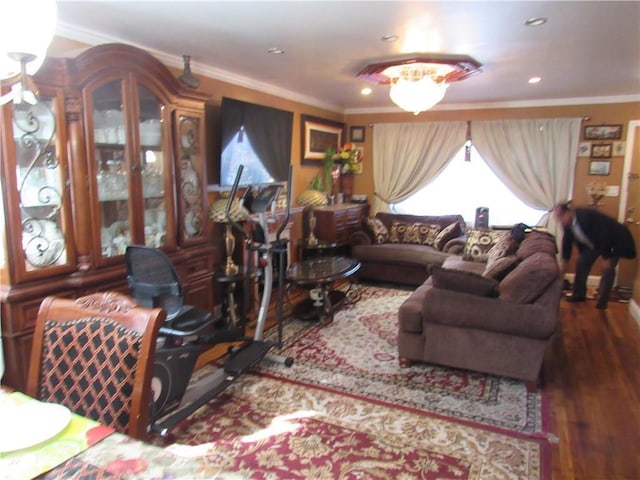 living room featuring ornamental molding and hardwood / wood-style floors