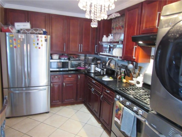 kitchen with stainless steel appliances, sink, ornamental molding, a chandelier, and light tile patterned floors