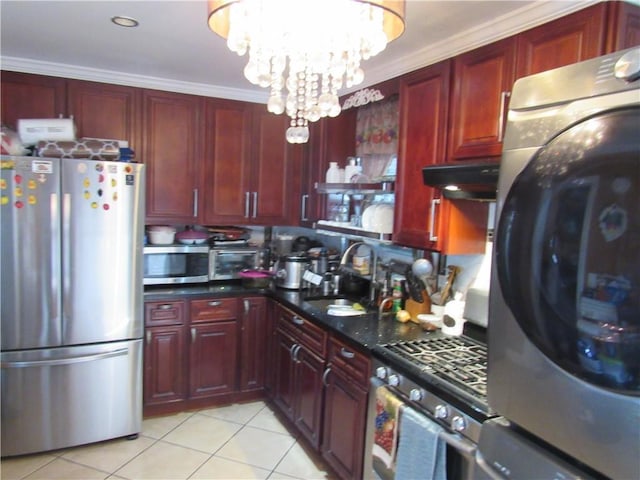 kitchen with an inviting chandelier, light tile patterned floors, appliances with stainless steel finishes, ornamental molding, and sink