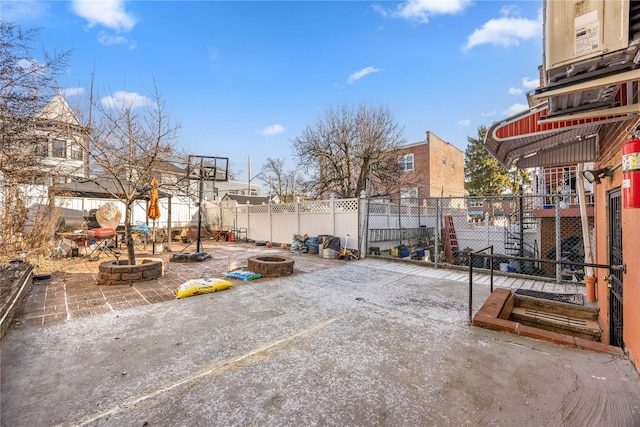 view of patio featuring an outdoor fire pit